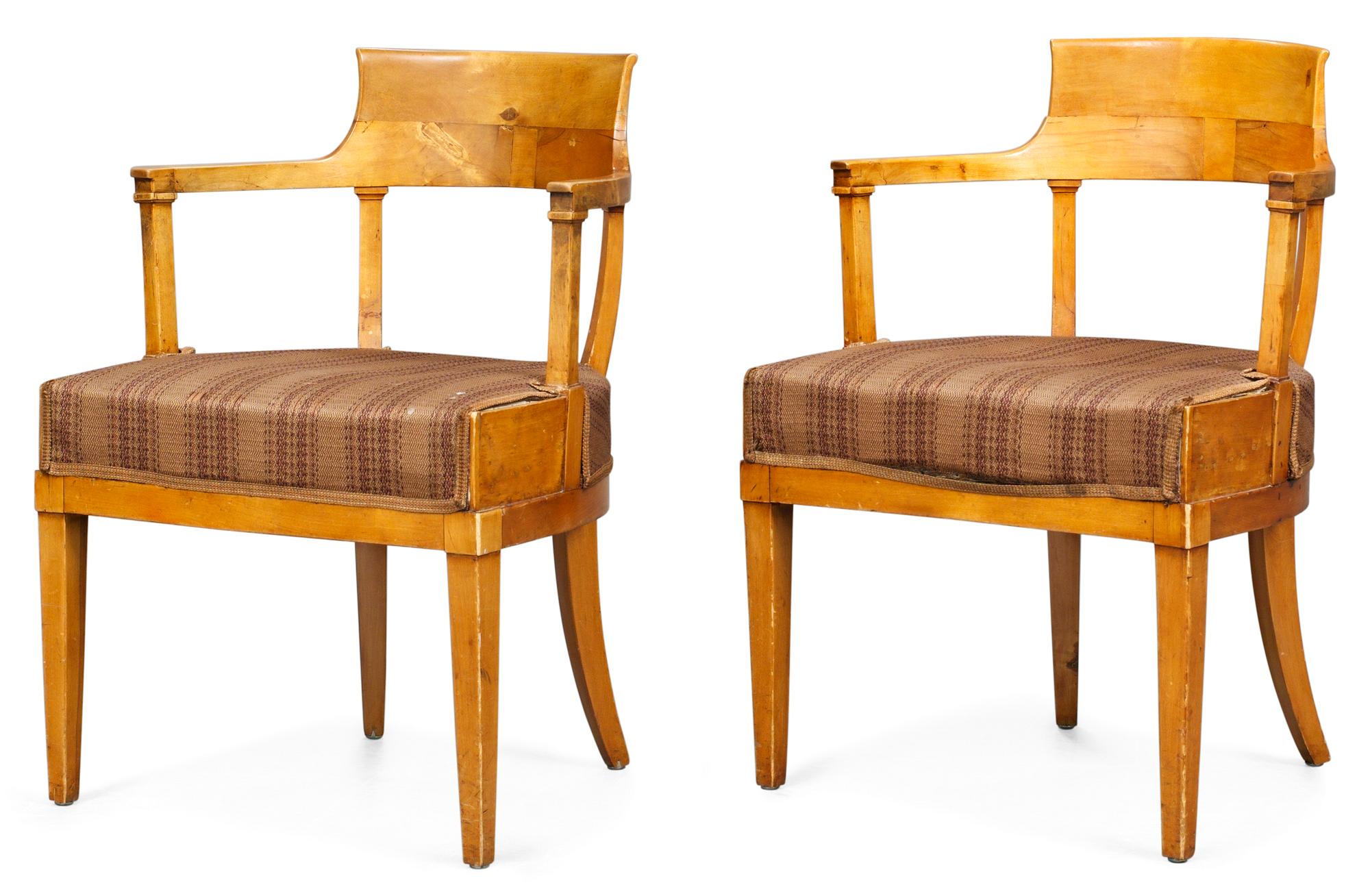A pair of Swedish Empire armchairs.