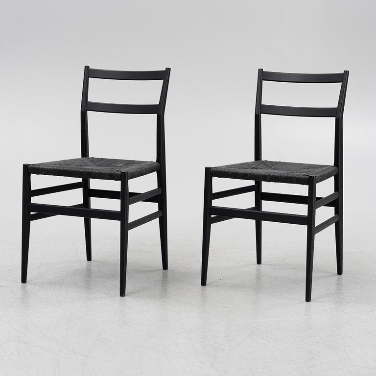 Gio Ponti, a pair of 'Leggera 646' chairs, Cassina, Italy.
