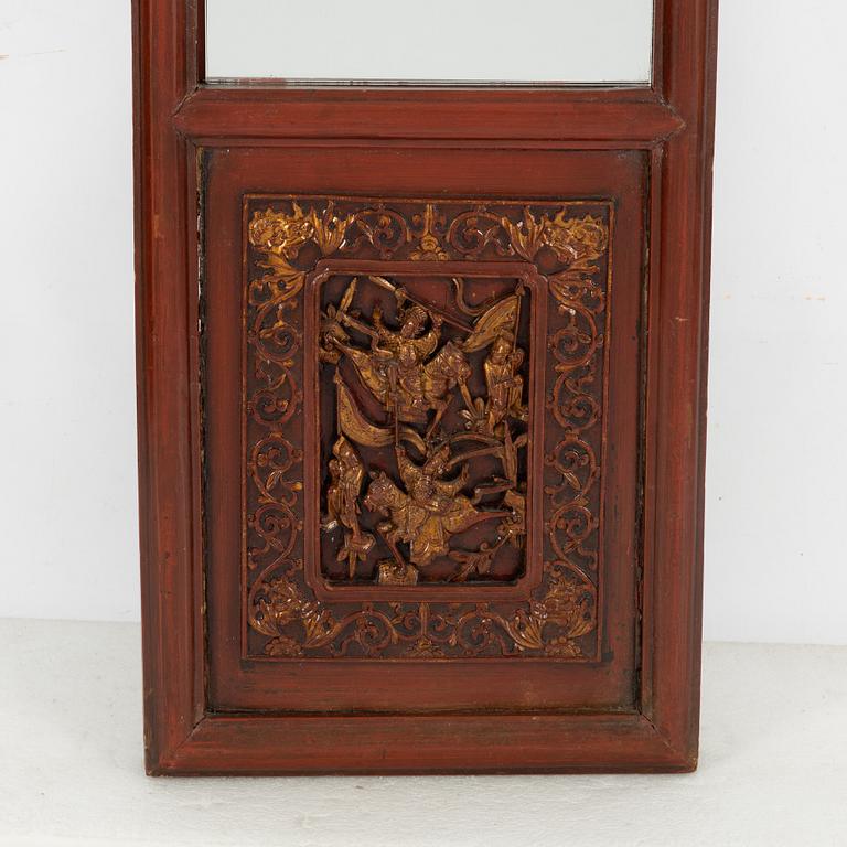 A panel with mirror glass, China, late Qing dynasty.