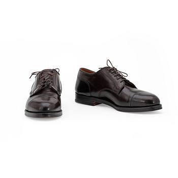 ALDEN, a pair of brown leather shoes.