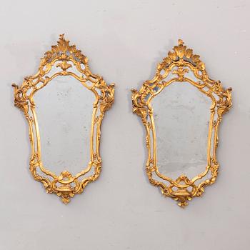 A pair of mid 20th century wood mirrors from Paoletti, Firenze Italy.