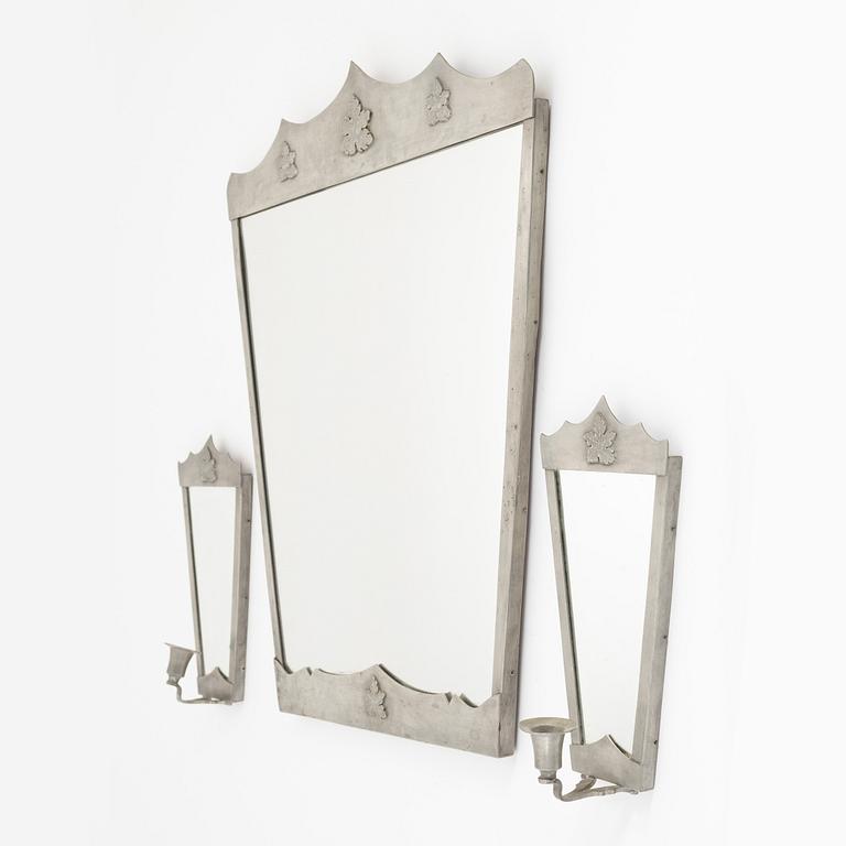 A pewter mirror with two sconces. 1930's/40's.