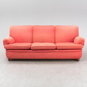 A model 703 sofa by Josef Frank for Firma Svenskt Tenn.