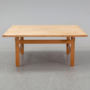An oak coffee table by Hans J Wegner for Andreas Tuck, Denmark.