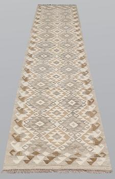 A runner, kilim, ca 387 x 79 cm.