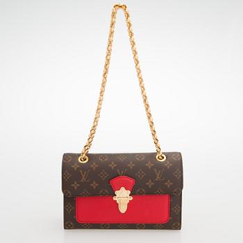 LOUIS VUITTON, A Monogram 'Victoire' Bag.