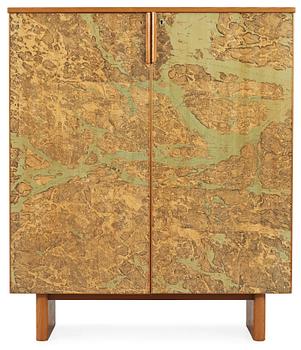 A G.A. Berg cabinet with printed map depicting the city of Stockholm, Sweden 1940's.