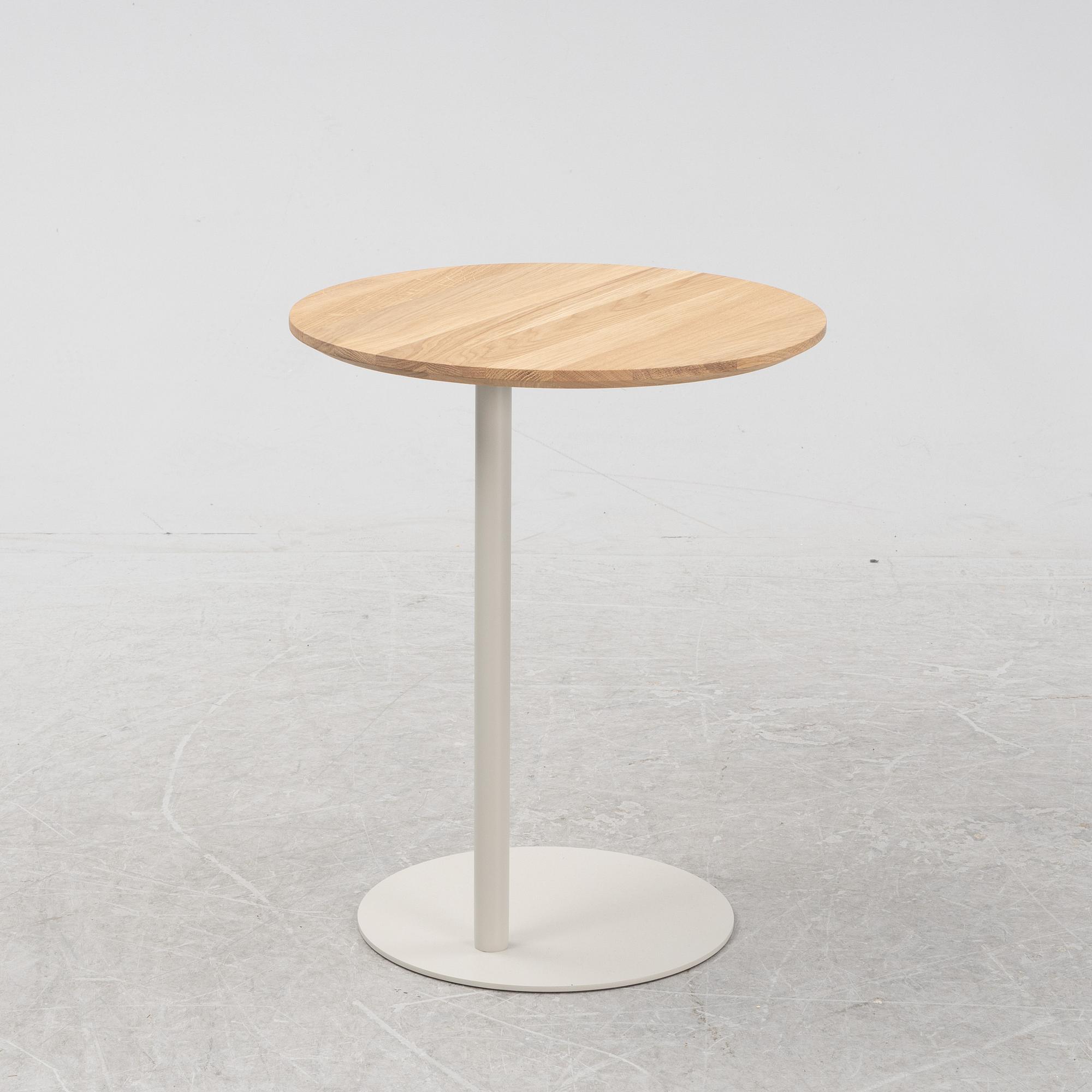 A contemporary 'Pillar' oak and steel side table by Michael H Nielsen for Bolia.