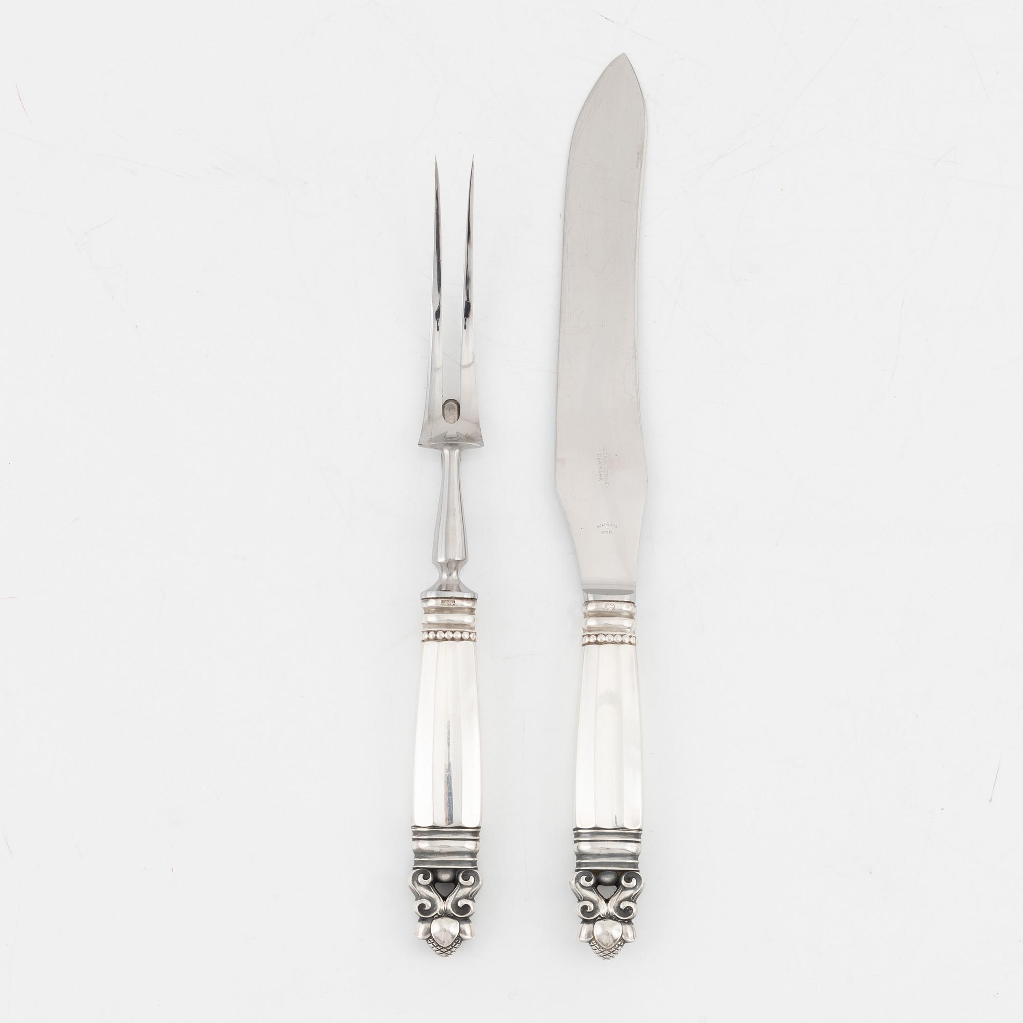 Johan Rohde, A sterling silver carving knife and fork set, 'Konge/Acorn', Georg Jensen, Denmark.