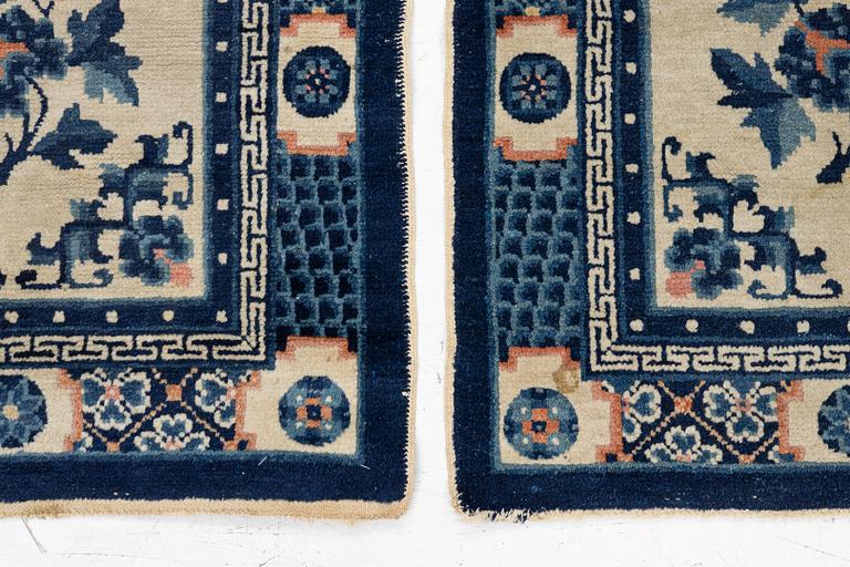 A pair of Baotou rugs, China, c. 120 x 64 cm.