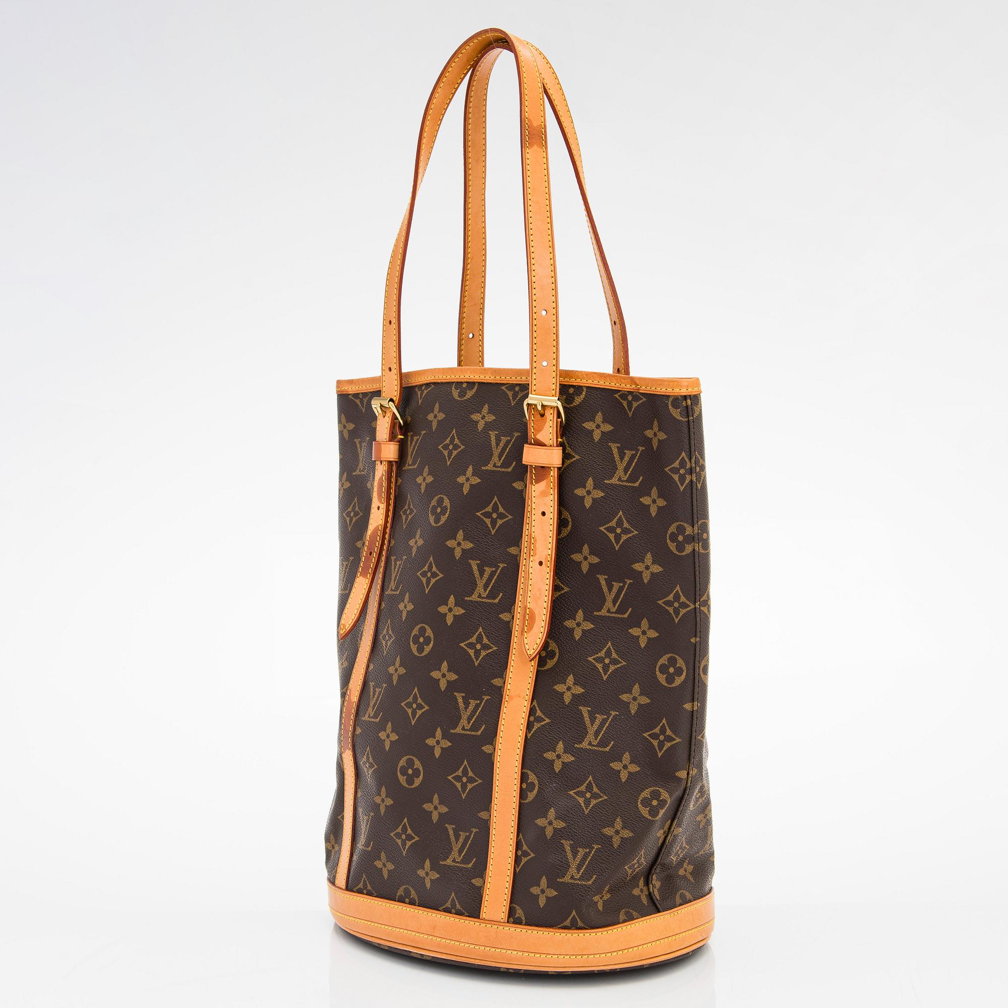 Louis Vuitton, a Monogram Canvas "Bucket" bag and pochette.