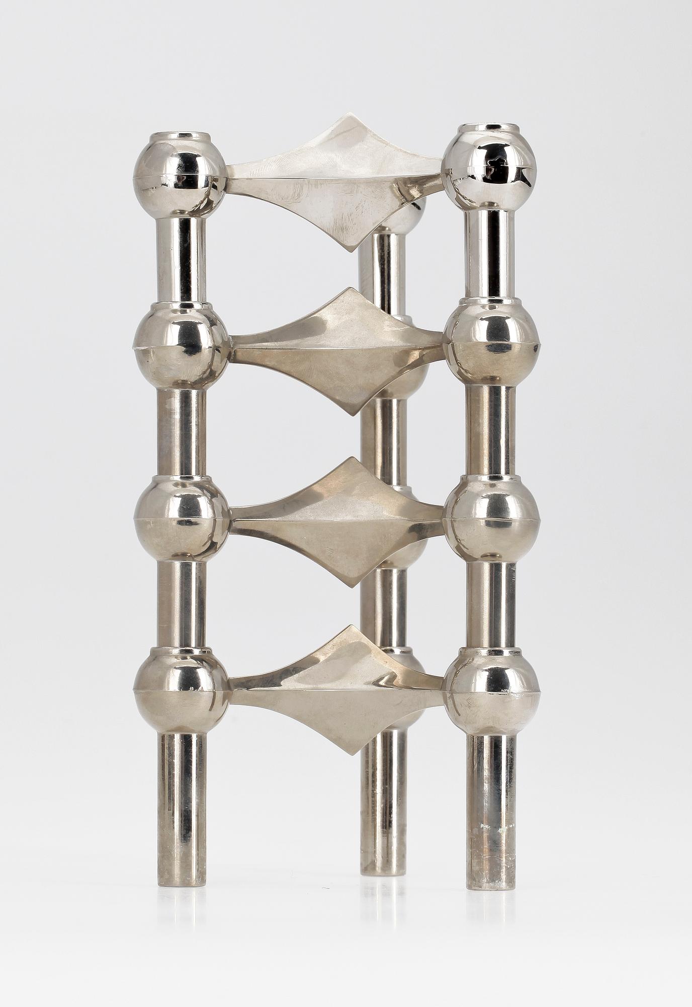 LJUSSTAKE, vitmetall, 4 delar, "Nagel", Ceasar Stoffi, 1900-talets andra hälft.