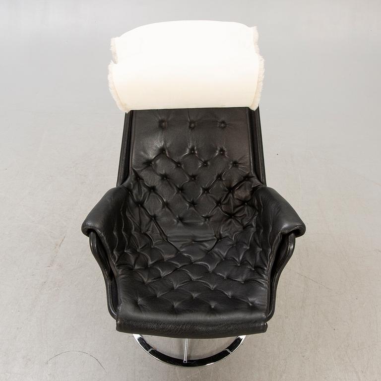 A Bruno Mathsson leather Jetson swivel chair for DUX later part of the 20th century.