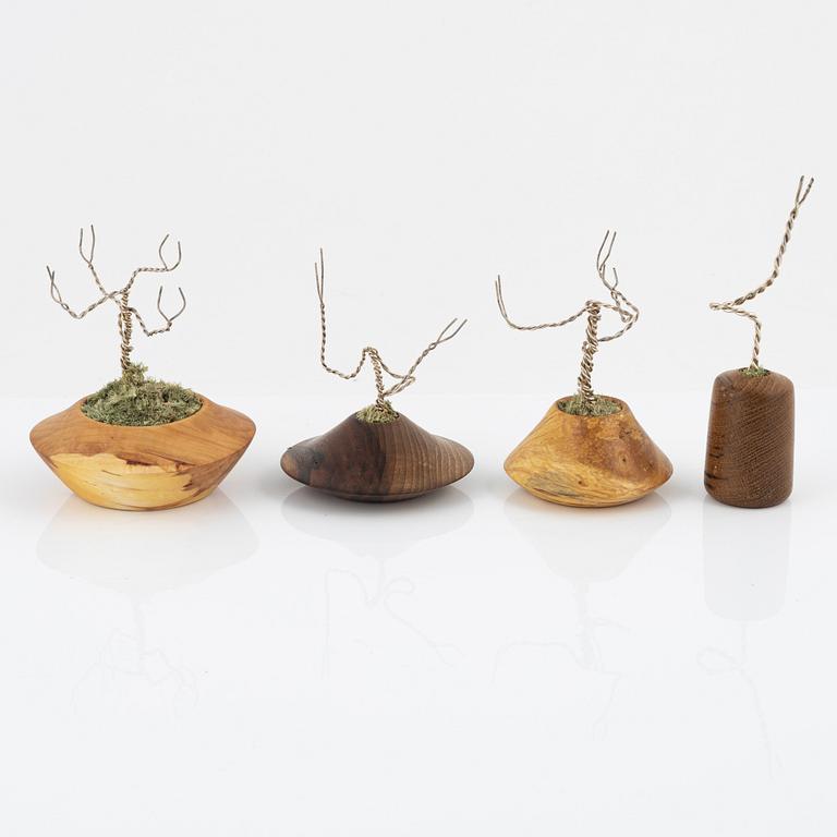 Magnus Ek, a set of four wood and silver snacks holders for Oaxen Krog.