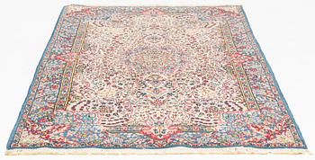 A rug, Kerman, ca 230 x 145 cm.