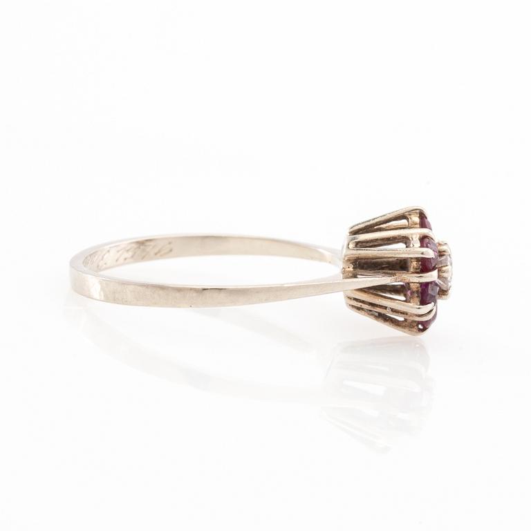 Ring 14K white gold set with a round brilliant-cut diamond and faceted rubies, Finland 1975.