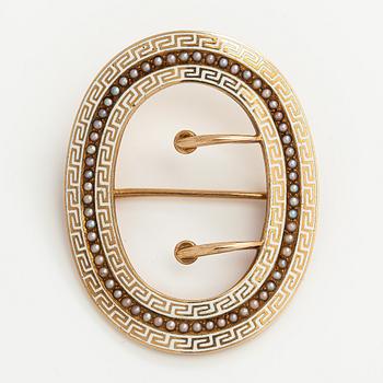 A 14K gold brooch with enamel and cultured pearls.