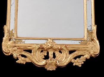 A Swedish Rococo 18th century mirror, dated 1769.