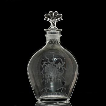 A Simon Gate engraved glass decanter with stopper, Orrefors, 1926.