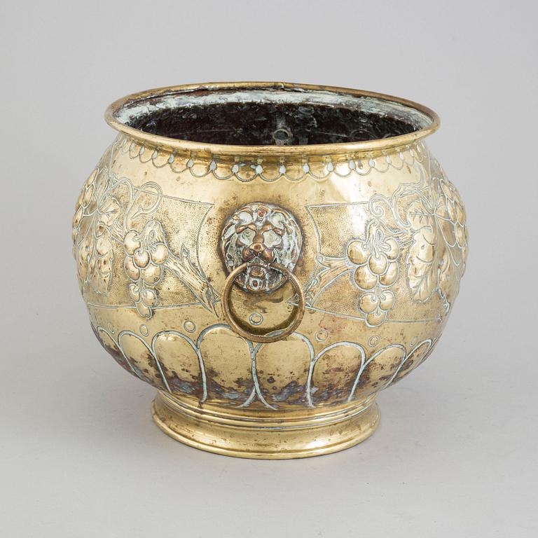 A 19TH CENTURY BRASS FLOWER POT.