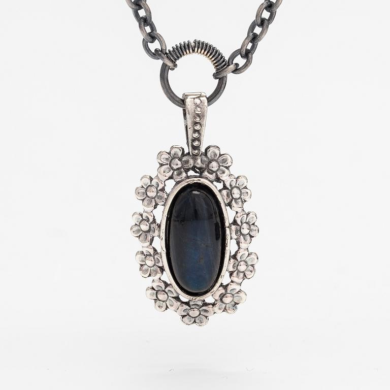 Jorma Laine, A silver necklace "Lemmikki" witha spectrolite. Turun Hopea, Turku.
