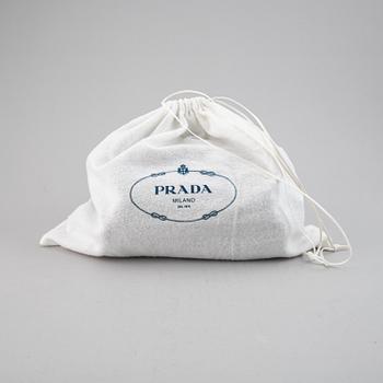 PRADA, a marsupio backpack.