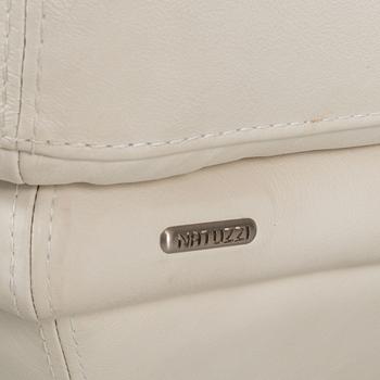 A white leather sofa, Natuzzi, Italy.