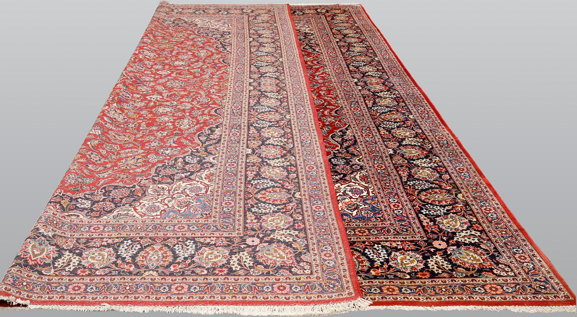 Carpet, Keshan, semi-antique, signed, 439 x 316 cm.