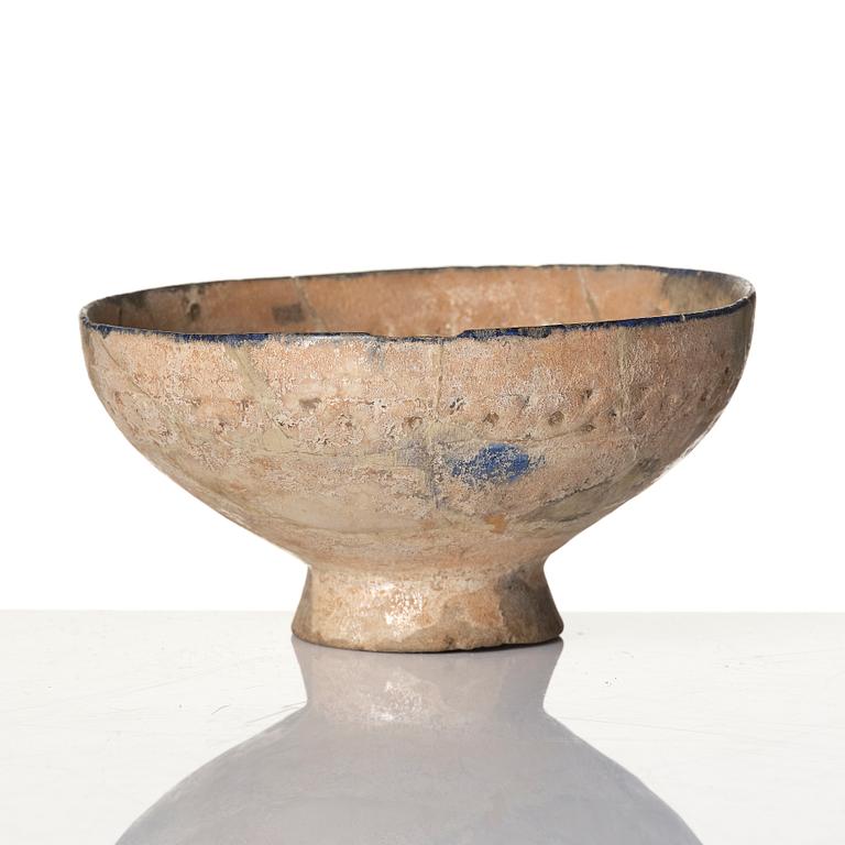 A central Asian pottery bowl,  13th century.