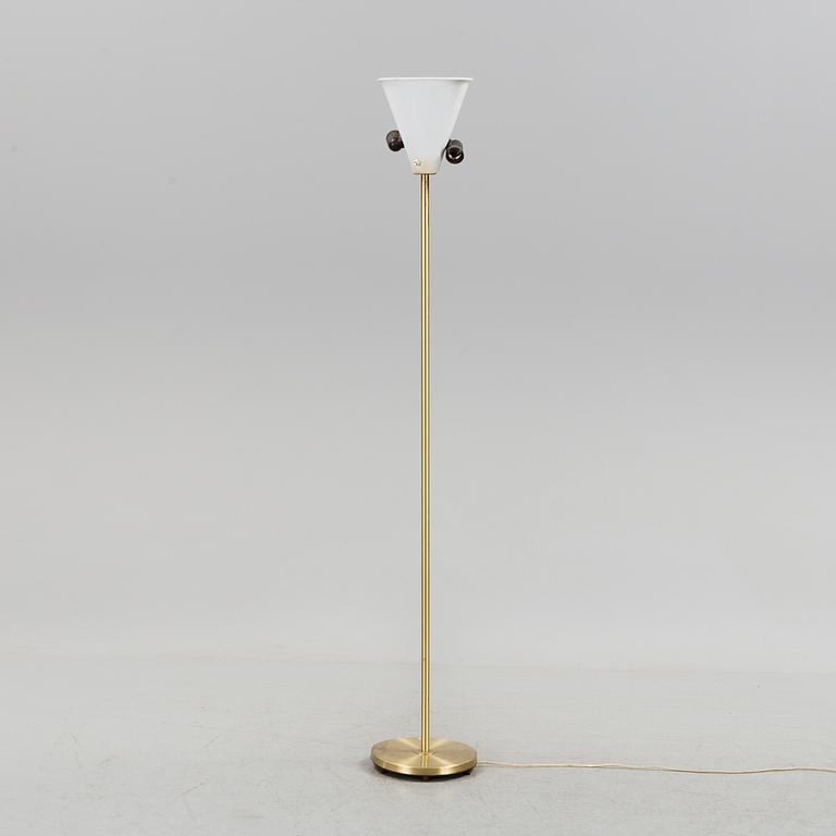 A 1960s brass floor light.