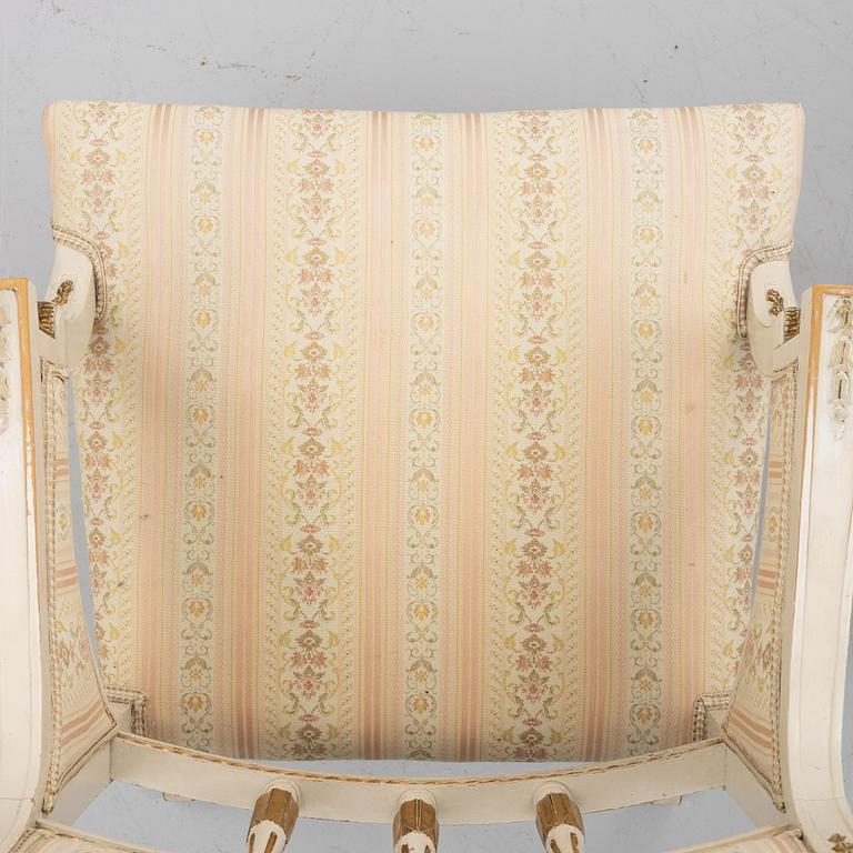 A pair of chairs and an armchair, late Gustavian style, early 20th century.