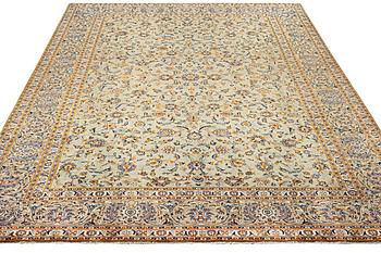 A Kashan carpet, a. 420 x 305 cm.
