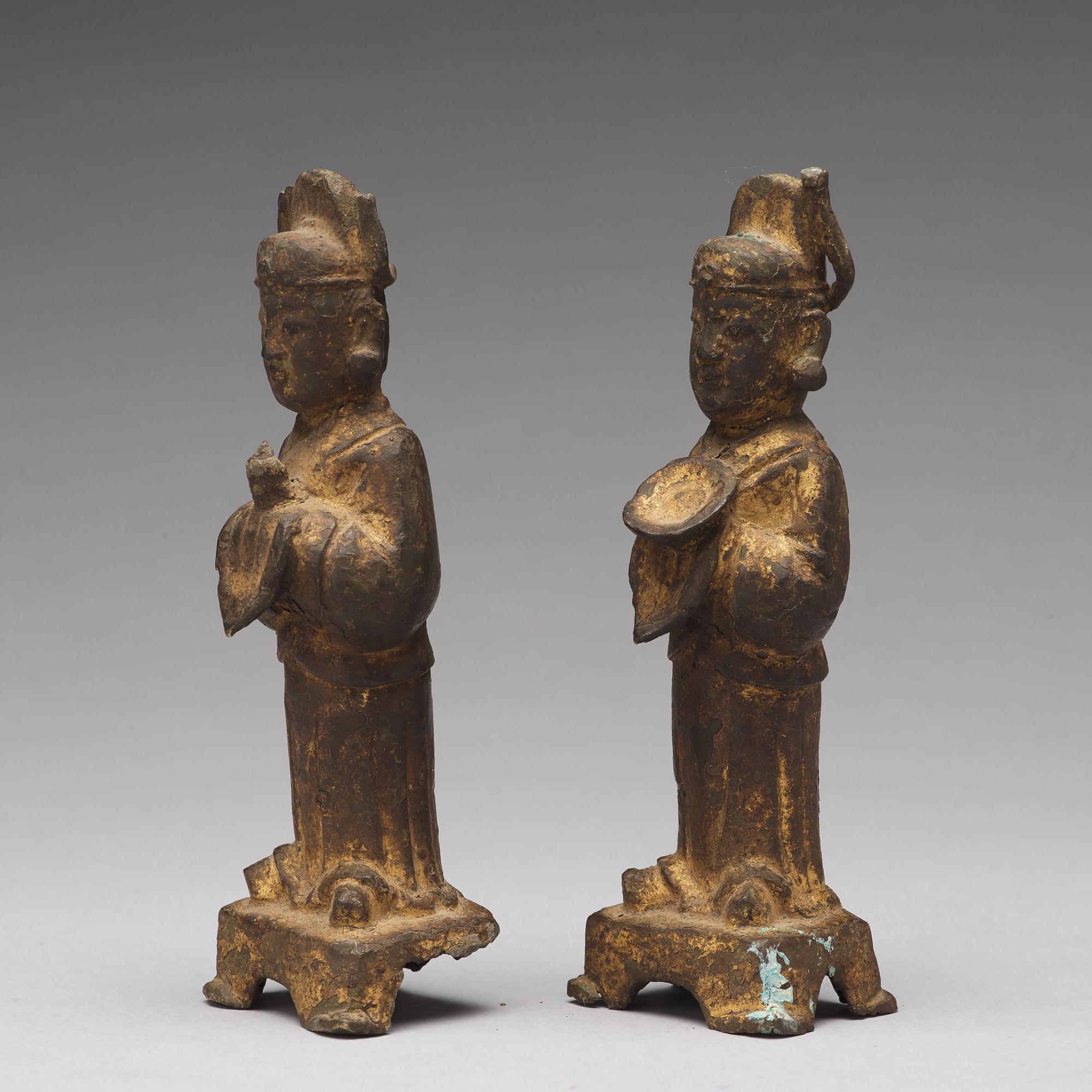 A pair of bronze figurines, Ming dynasty, 17th Century.
