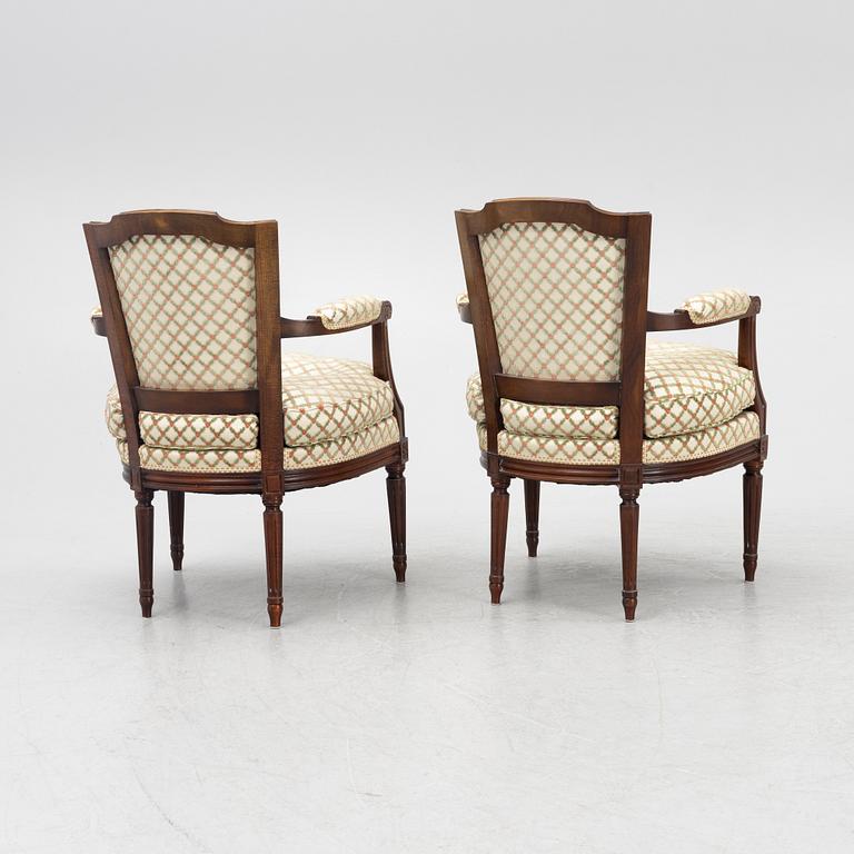 A Pair of Louis XVI Style Armchairs, 20th Century.