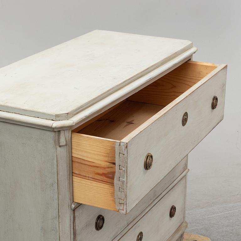 A pair of painted late gustavian-style chest of drawers.