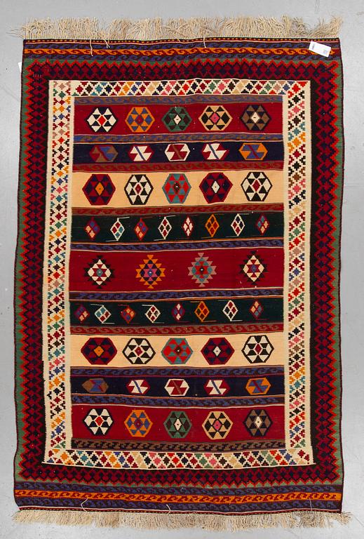 A CARPET, Persian kilim, ca 240 x 167 cm.