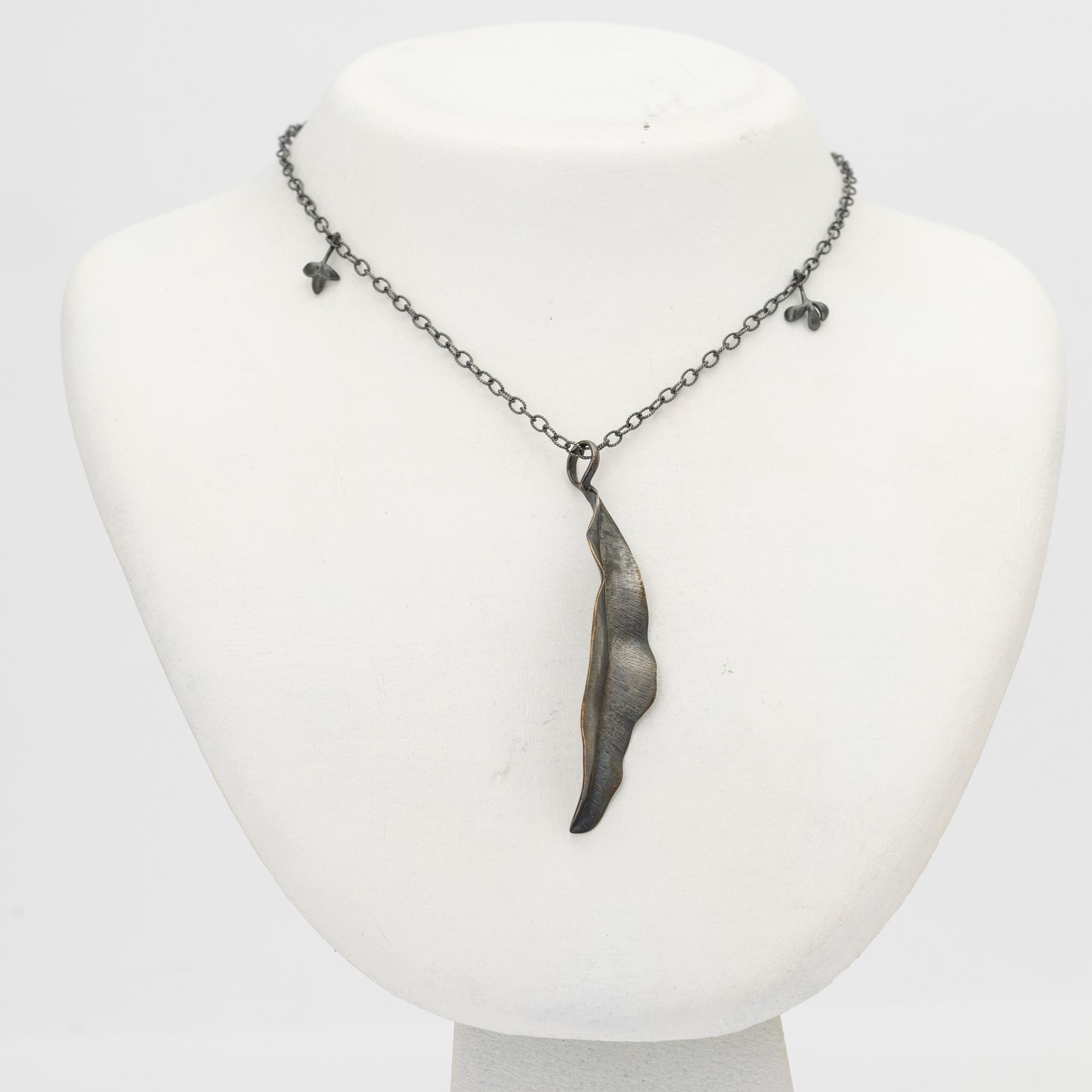 Ole Lynggaard, Chain with pendant, oxidised silver with leaf-shaped pendants, designed by Charlotte Lynggaard.