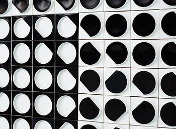 A Victor Vasarely porcelain wall relief by Rosenthal.