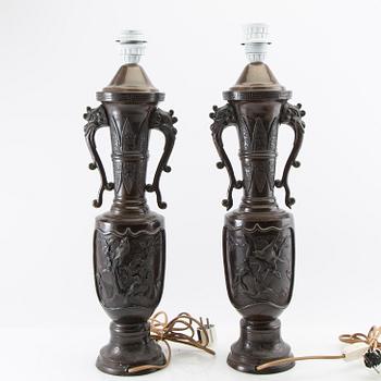 Table lamps a pair China 20th century patinated metal.