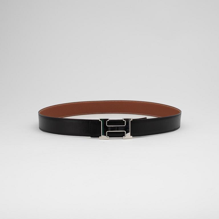HERMÈS, a reversible leather belt.
