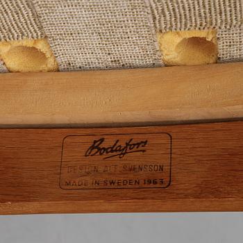A pair of easy chairs by Alf Svensson for Bodafors, dated 1963.