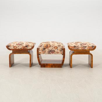 A pair of stools and an Art Deco from the first half of the 20th century.