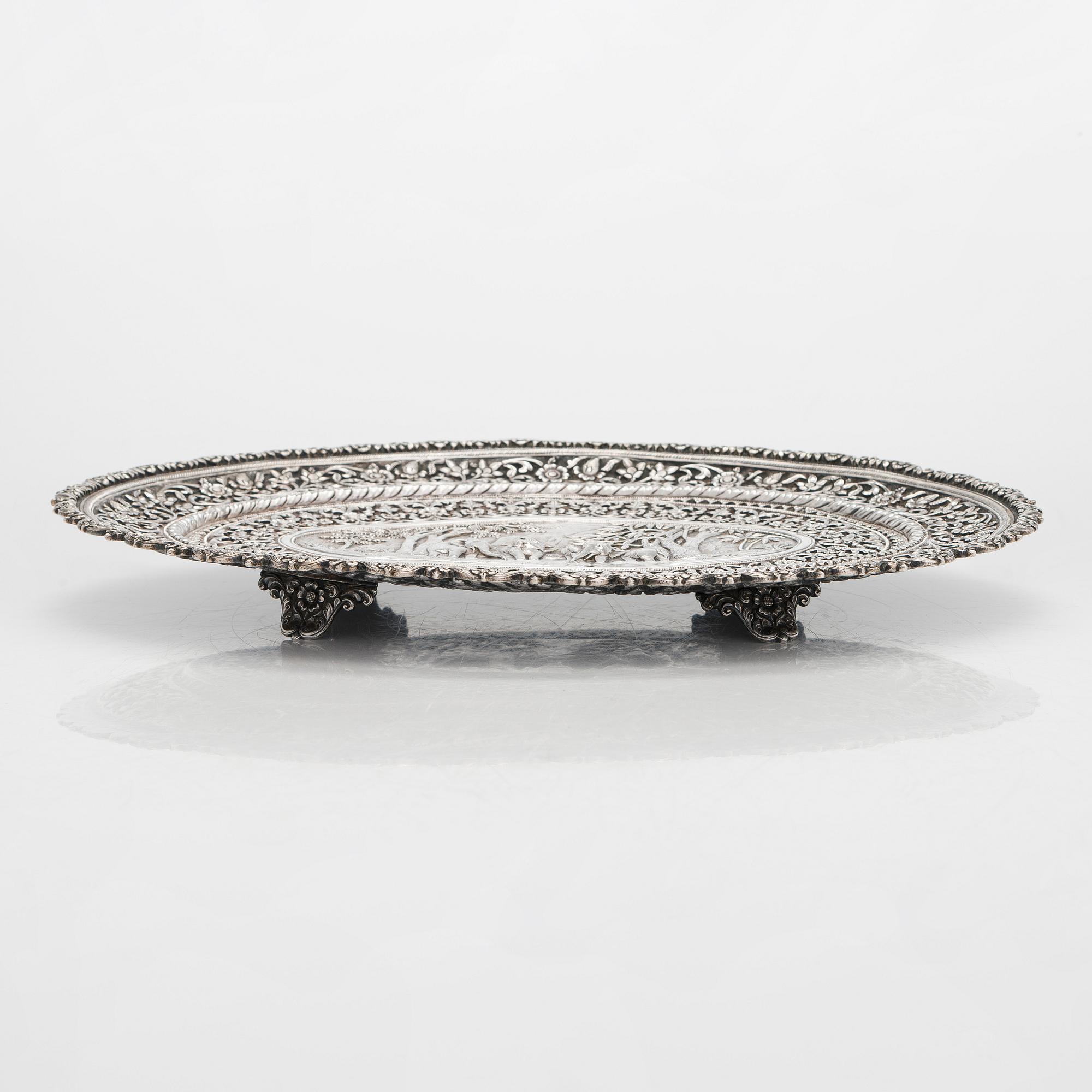 A silver salver, marked OM BHUJ for Oomersi Mawji, Bhuj, Kutch, India, circa 1860-1890.