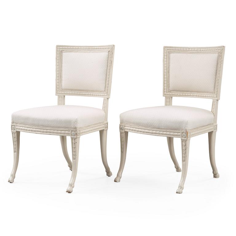 A pair of late Gustavian early 19th century chairs attributed to Ephraim Ståhl, master 1974.