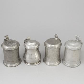 Four Swedish pewter tankards, 19th century.