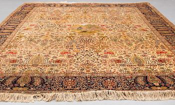 A CARPET, a semi-antique Tabriz probably, figural, ca 325,5 x 226 cm.