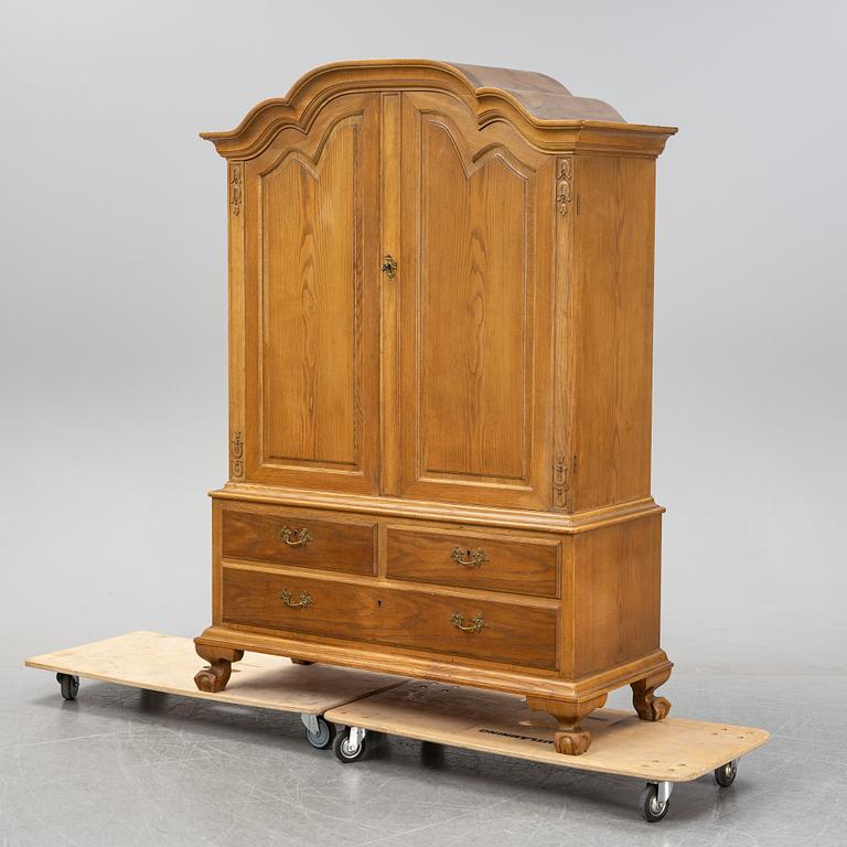 A 20th Century baroque style cabinet.