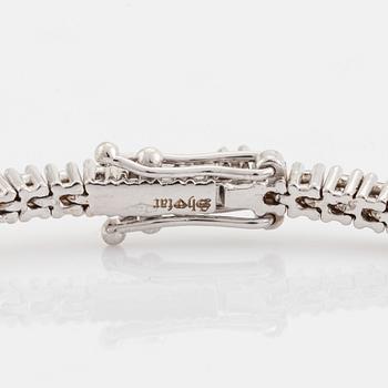 Brilliant cut diamond tennis bracelet.