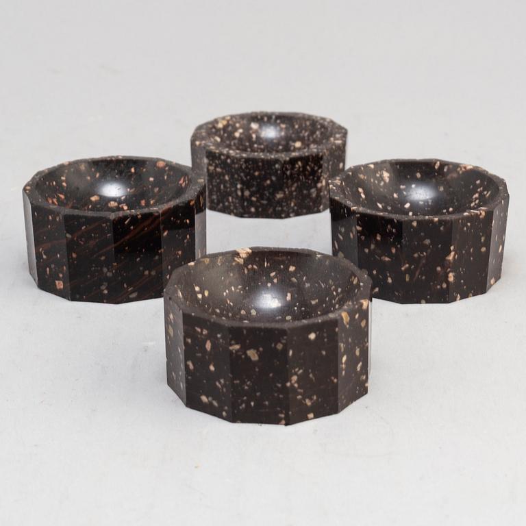 Three plus one porphyry salt cellars, Empire, second quarter of the 19th century.