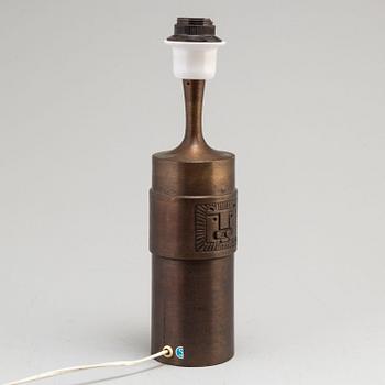 STIG BLOMBERG, a bronze table light.